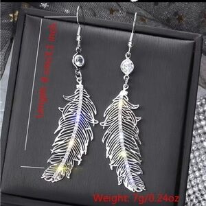 Silver feather earrings